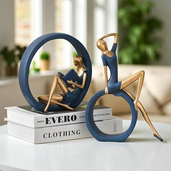 Figure Reading and Yoga Girl Sculpture.